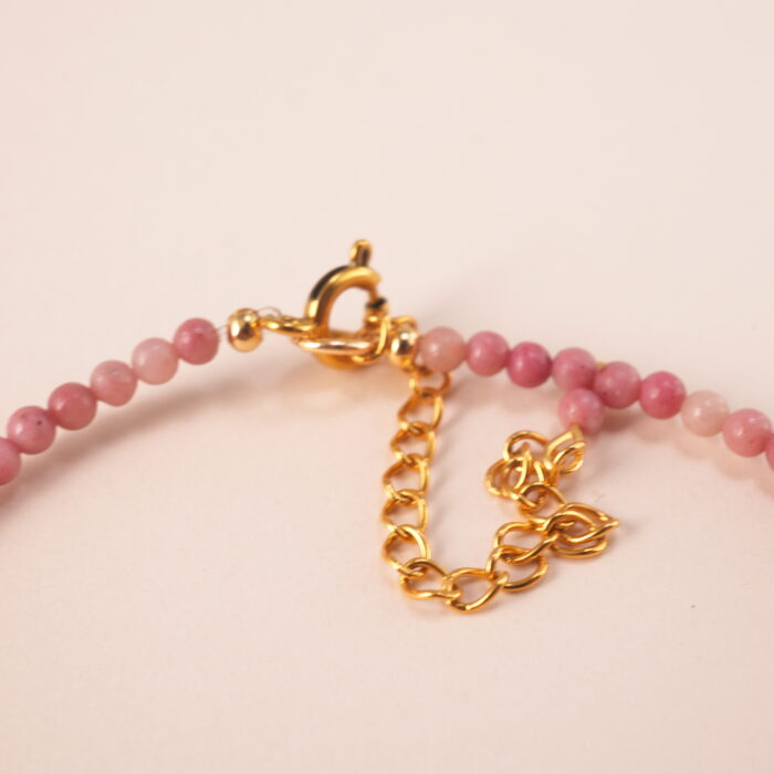 Close-up of the Rhodochrosite stone beads and adjustable cord