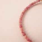 Close-up of the Rhodochrosite stone beads and adjustable cord