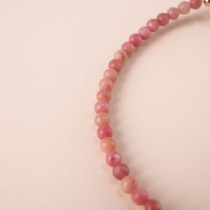 Close-up of the Rhodochrosite stone beads and adjustable cord