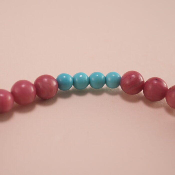Close-up of Rhodochrosite, Turquoise Beads and Flower Charm – Elegant Gemstone Charm Bracelet