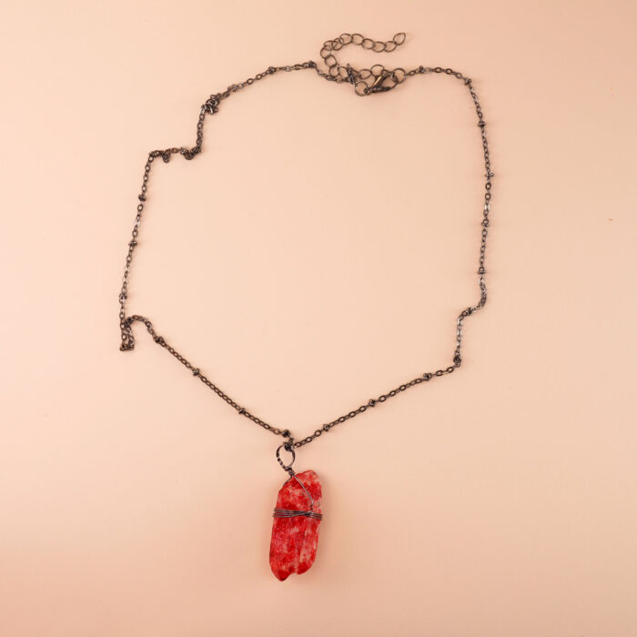 Handmade bloodstone pendant on dark or neutral background highlighting deep green with red flecks