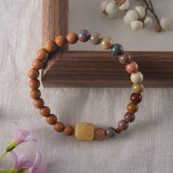 Detailed view of bead bracelets with durable elastic cord and natural wood beads