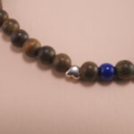 Close-up of Sandalwood, Lapis Lazuli, and Garnet Beads – Natural Wood Bracelet