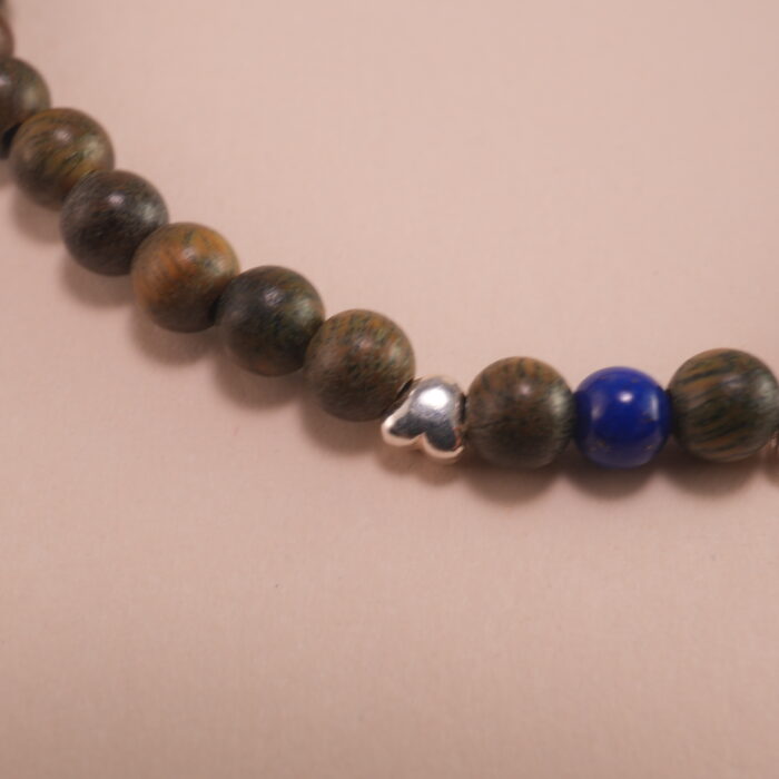 Close-up of Sandalwood, Lapis Lazuli, and Garnet Beads – Natural Wood Bracelet