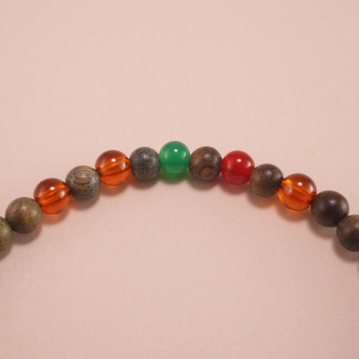 Close-up of Sandalwood, Lapis Lazuli, and Garnet Beads – Natural Wood Bracelet
