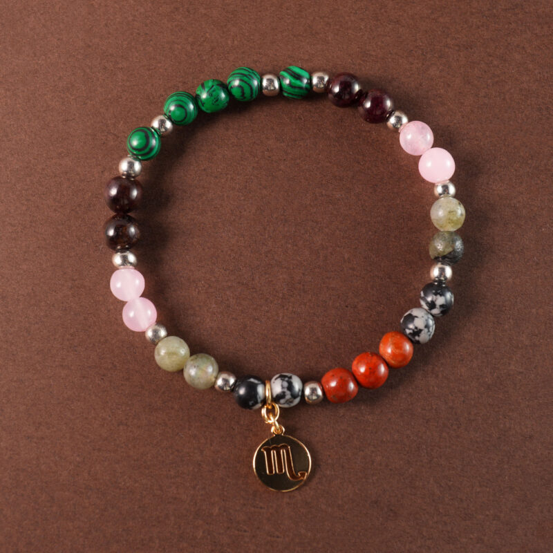 Scorpio bracelet with malachite, rose quartz, red jasper, gray moonstone, and snowflake obsidian beads