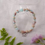 Bracelet placed in a serene, natural setting with soft lighting