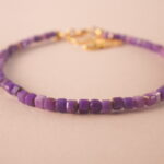 Detailed image of the bracelet showing the polished finish and small, elegant beads.