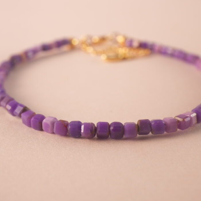 Detailed image of the bracelet showing the polished finish and small, elegant beads.