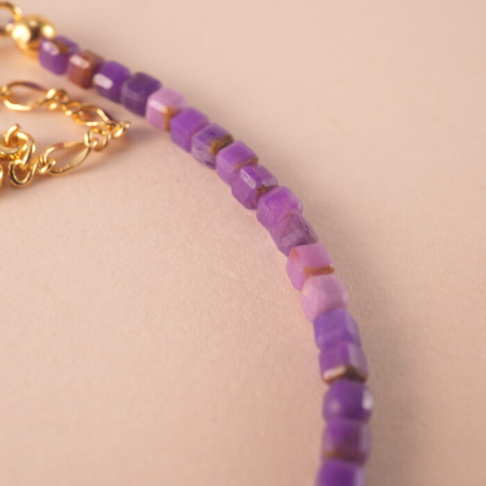 Detailed image of the bracelet showing the polished finish and small, elegant beads.