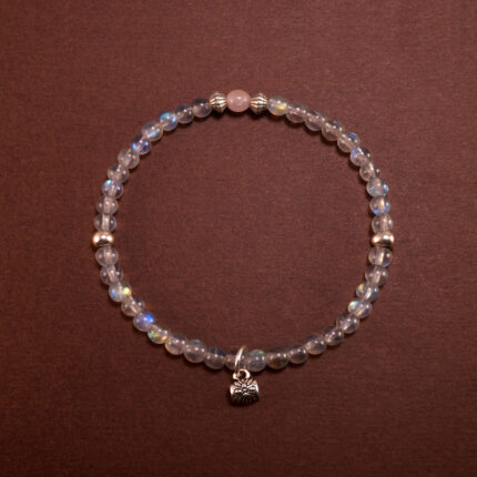 Handmade Chalcedony bracelet with floral and leaf charms, designed to promote restful sleep