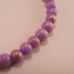 Close-up of Tiger Eye and Purple Chalcedony Beads with S925 Heart Charm
