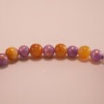 Close-up of Tiger Eye and Purple Chalcedony Beads with S925 Heart Charm