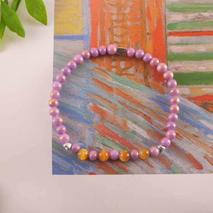 Tiger Eye and Chalcedony Bracelet placed in a serene natural setting with soft light