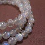 Close-Up of 6mm Gray Moonstone Beads in Layered Design – Soft Polished Texture