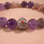 Close-up of smooth amethyst beads with rich purple hues