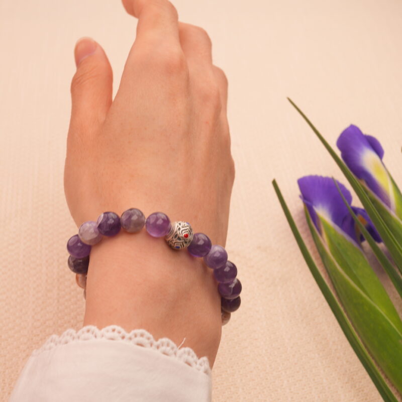 Amethyst crystal bracelet worn on wrist – Perfect for calm and nighttime use