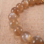 Close-up of smooth, glowing moonstone beads