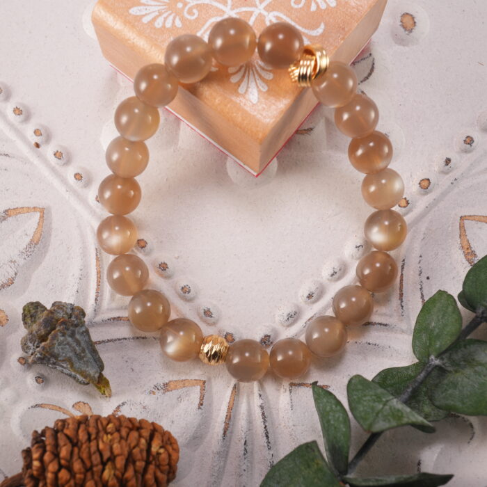 Moonstone bracelet styled in a soft, natural environment