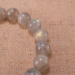 Close-up of natural moonstone beads showing texture and sheen