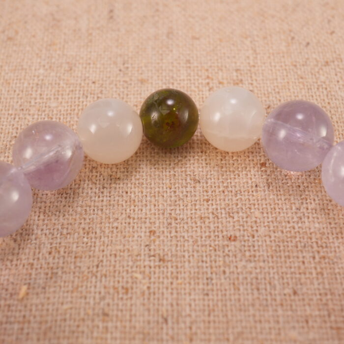 Close-up of faceted amethyst beads highlighting clarity and cut