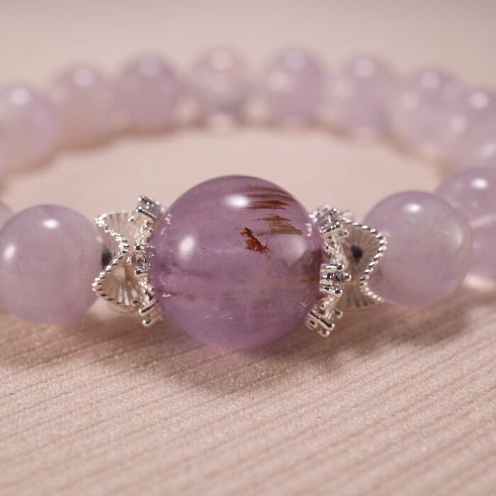 Close-up of amethyst bead texture showing soft purple hues