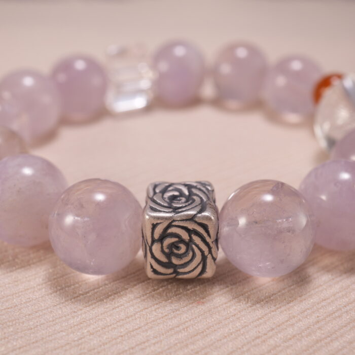 Close-up of transparent quartz beads and soft purple amethyst