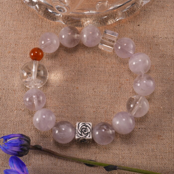 Bracelet resting in a peaceful natural setting with soft light