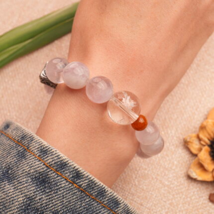 Bracelet worn on the wrist, paired with a minimalist outfit