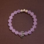 Lavender amethyst moon bracelet with 8mm beads arranged in a clean circular form