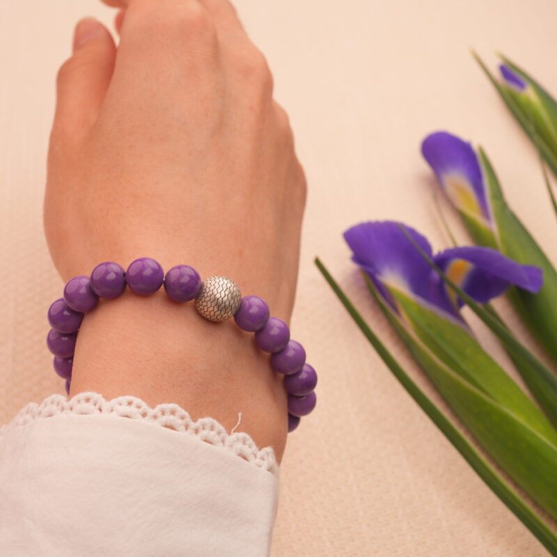 Worn on the wrist, paired with a cozy outfit, symbolizing tranquility and emotional grounding