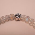 Close-up view of moonstone beads with natural shimmer and fine polish