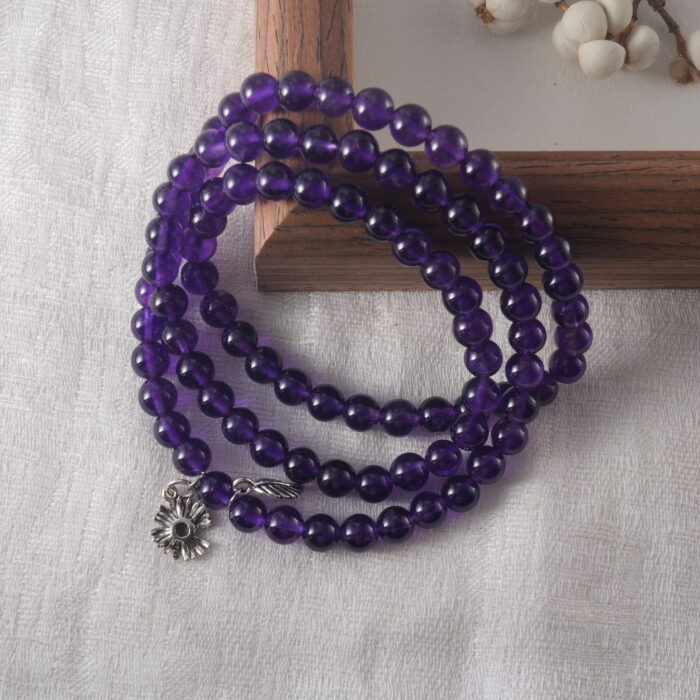 Bracelet resting in a calm, nature-inspired setting that suggests emotional peace