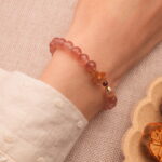 Wearing Strawberry Quartz & Pearl Flower Bracelet – Feminine and Healing Crystal Jewelry