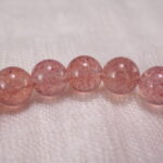 Close-up of Strawberry Quartz Beads, Pearls and Flower Charm – Elegant Handmade Bracelet