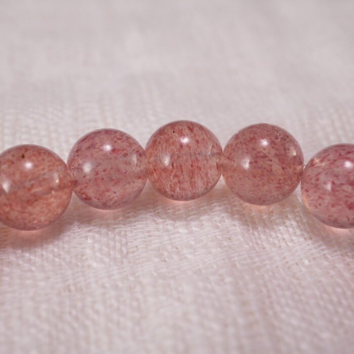 Close-up of Strawberry Quartz Beads, Pearls and Flower Charm – Elegant Handmade Bracelet