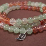 Close-up of Strawberry Quartz Beads – Triple Layer S925 Healing Bracelet