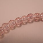 Close-up of Handmade Strawberry Quartz and Silver Beads – Bracelet for Love and Warmth
