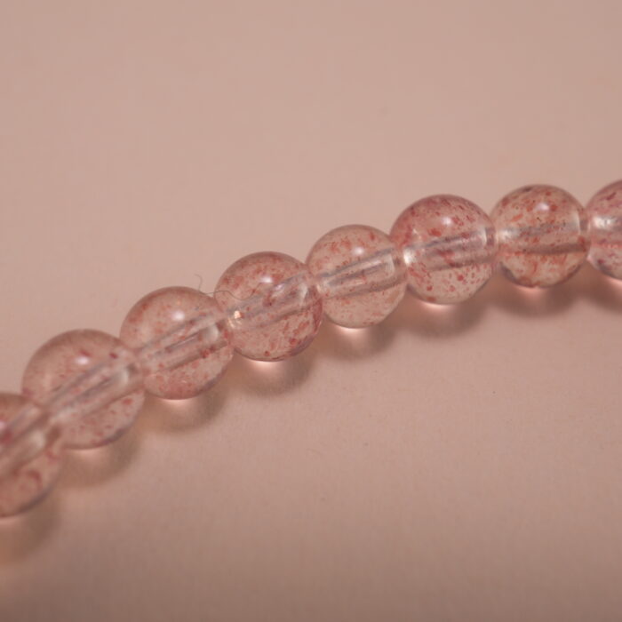 Close-up of Handmade Strawberry Quartz and Silver Beads – Bracelet for Love and Warmth