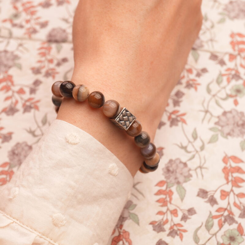 Man wearing Stripe Persian Bay Agate S925 Bracelet, demonstrating its fit and minimalist style