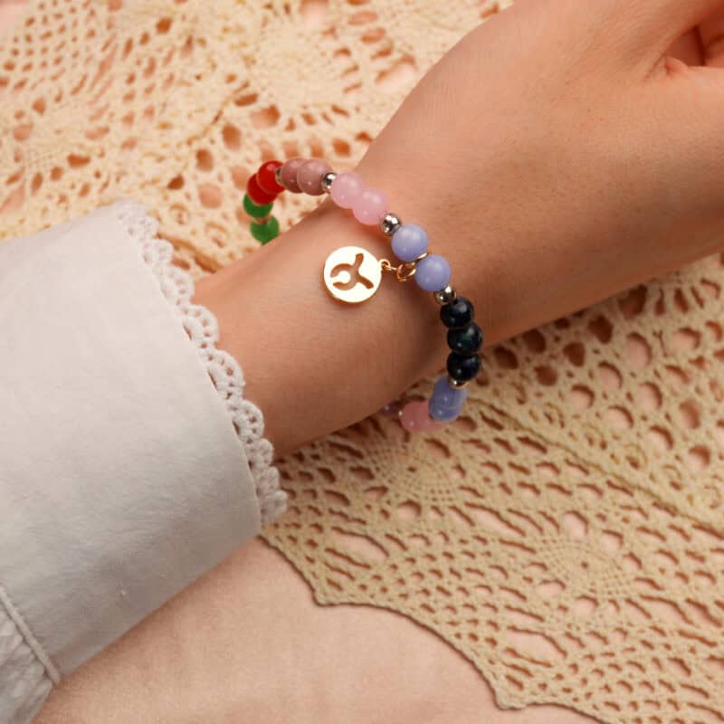 Taurus Zodiac Bracelet worn on wrist with colorful gemstone beads