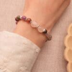 Wearing Tourmaline Bracelet with Silver Cross Charm – Spiritual Gemstone Jewelry