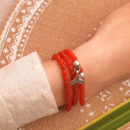 Red Agate 4mm stacking bracelet worn on wrist, layered with minimalist jewelry
