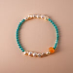 Turquoise and pearl beaded bracelet for good luck and healing