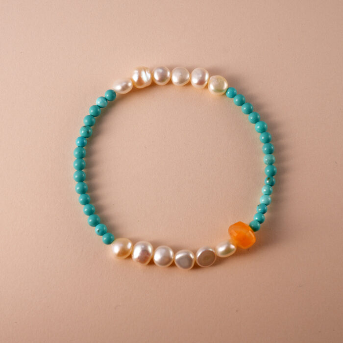Turquoise and pearl beaded bracelet for good luck and healing