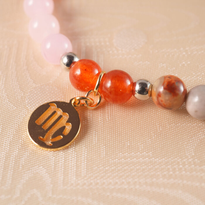 Close-up of Virgo bracelet beads and adjustable cord