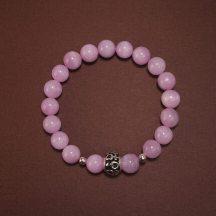 8mm kunzite bracelet with soft lavender-pink tones on white background