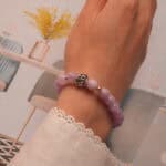 Worn on wrist to highlight the gentle color and polished 8mm beads