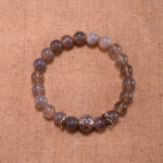 Handmade 8mm agate gemstone bead bracelet displayed on clean background