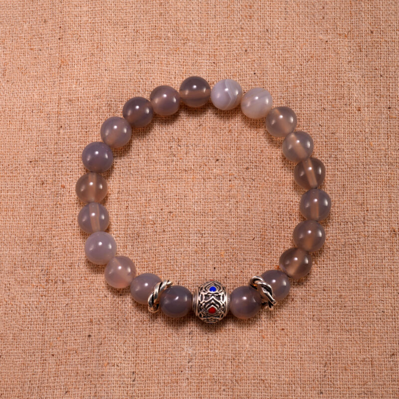 Handmade 8mm agate gemstone bead bracelet displayed on clean background